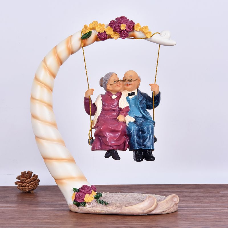 تماثيل راتين مسننين على أرجوحة - مراجعة Resin Art Wedding Gift وسعره